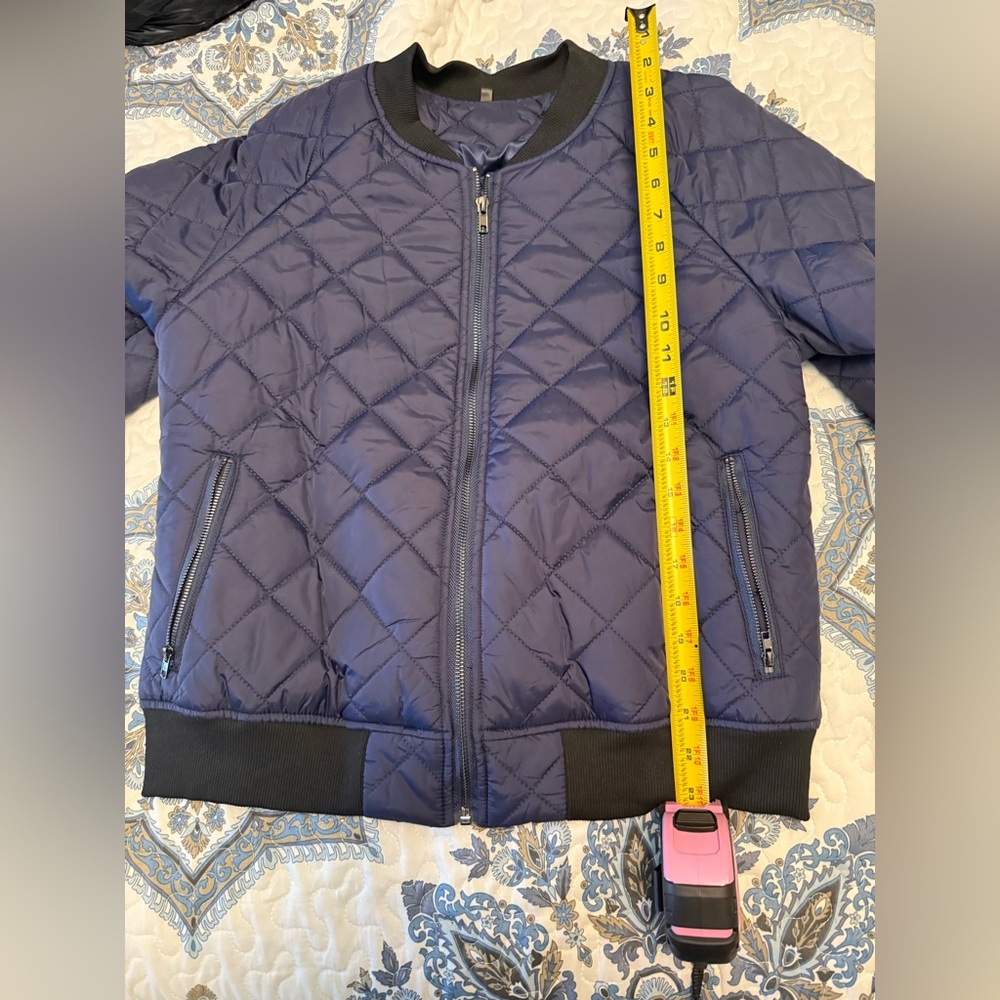 Navy blue diamond puffer bomber jacket. Size medium, new. No tags